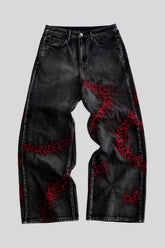 Centipede Embroidered Distressed Flared Denim Jeans