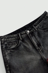 Centipede Embroidered Distressed Flared Denim Jeans
