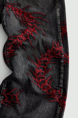 Centipede Embroidered Distressed Flared Denim Jeans