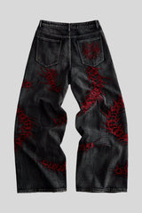 Centipede Embroidered Distressed Flared Denim Jeans