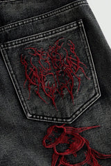 Centipede Embroidered Distressed Flared Denim Jeans